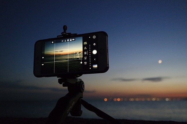 tripod with smartphone at night