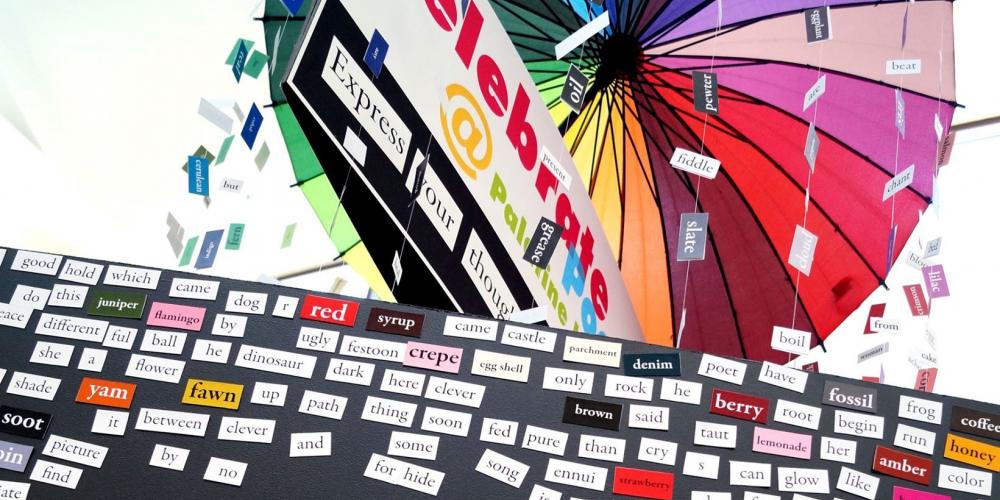 Photo of a poems made my magnet words under a colorful umbrella.