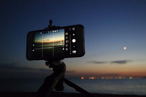 smartphone on tripod at night