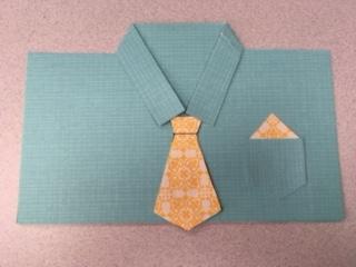 blue shirt with yellow patterned tie greeting card.