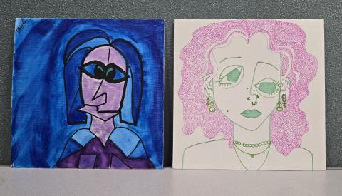 Two canvases with self portraits in the style of cubism. Geometric shapes for the body or hair.