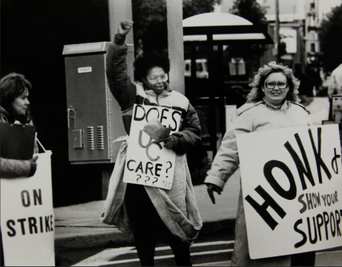 Women holding signs at a protest